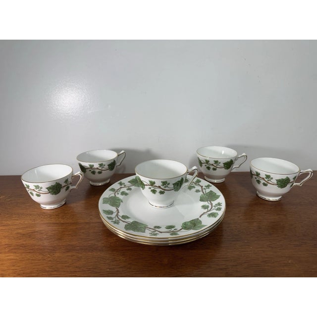 Vintage Crown Staffordshire England fine bone china bundle in the classic Green Ivy pattern. Includes 5 footed teacups and...