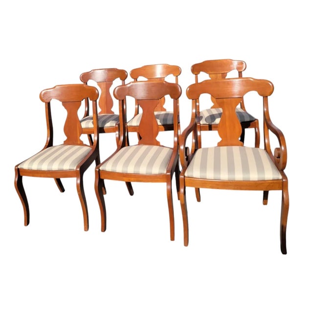 Set of 6 original 1940s Second Empire style dining chairs made of solid cherry wood. Includes 5 side chairs and 1 armchair...