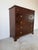 A beautiful 19th-century solid mahogany chest of drawers featuring a timeless English design with rich mahogany grain,...