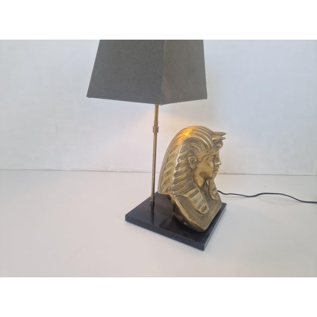 Regency Brass Pharaoh Table Lamp in the style of Maison Jansen, 1970s, in Flawless conditions. Designed 1970 to 1979...
