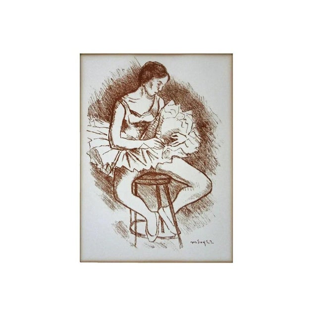 A beautiful sepia lithograph, “Seated Ballerina,” by Russian-born American artist Moses Soyer (1899–1974)—a celebrated...