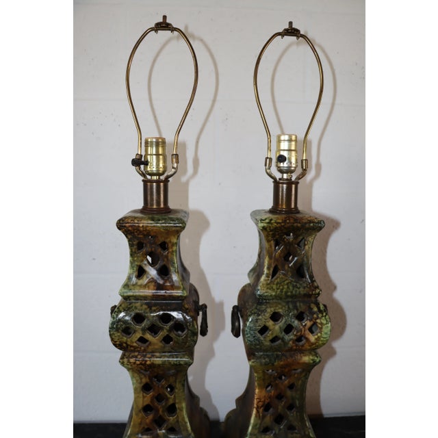A pair of mid century pierce cut lamps.