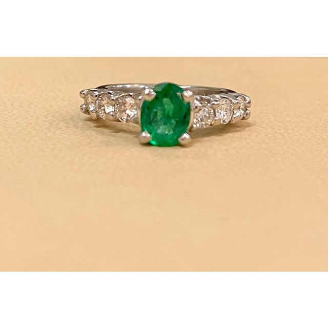 Natural 1.25 Carat Oval Cut Emerald & 0.90 Carat Diamond Ring Platinum For Sale - Image 17 of 18