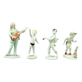 20th Century Porcelain Sculptures of 4 Children from Hollohàza Manufactory, Aquincum, Hungary, Mid-1950s, Set of 4 For Sale
