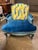 This is a custom upholstered Vintage French Bergere chair with peacock feather pattern on a yellow backdrop. There are 4...