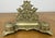 An exceptionally decorative Vintage brass inkwell set featuring ornate cherub detailing and elegant classical styling...