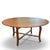 A beautiful, rustic yet refined large round dining table. Planed top with elegant cabriole legs joined by a carved...