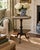 A handsome Georgian-style drinks table crafted in rich solid mahogany. The elegant turned pedestal and tripod base draw...