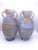 A matching pair of Murano glass vases with Roman-inspired amphora forms, flared mouths, applied loop handles, and glass...