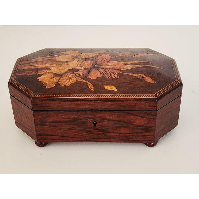 Antique 19th century victorian inlay marquetry rosewood jewelry box. A beautiful handcrafted jewelry box featuring a...