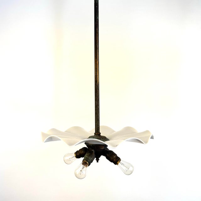 Beautiful aged patina on this japan finish 4 light milk glass petticoat hanging fixture. 4 E26 Sockets New Wire 18.5”...