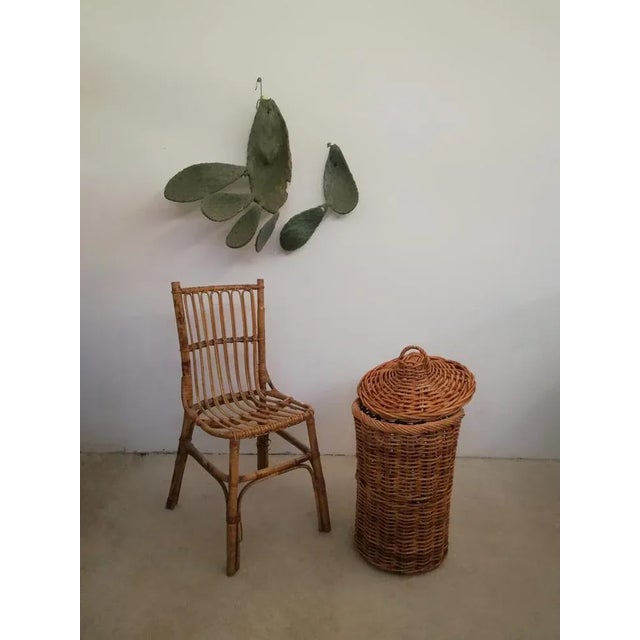 Splendid basket made entirely by hand in Italy using thin performance branches treated. Datable around the 50s, but...