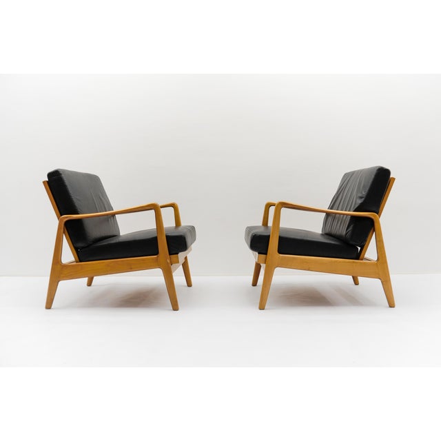 A fantastically sleek design. Adjustable seat position. Footstool: Height 44cm, Width 47cm, Depth 45cm. Armchair: Seat...