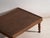 This antique japanese folding low table is a floor table in wood with folding turned legs. It originates from japan, from...