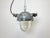 Dark grey industrial lamp with massive protective glass bulb made by Elektrosvit in former Czechoslovakia during the...