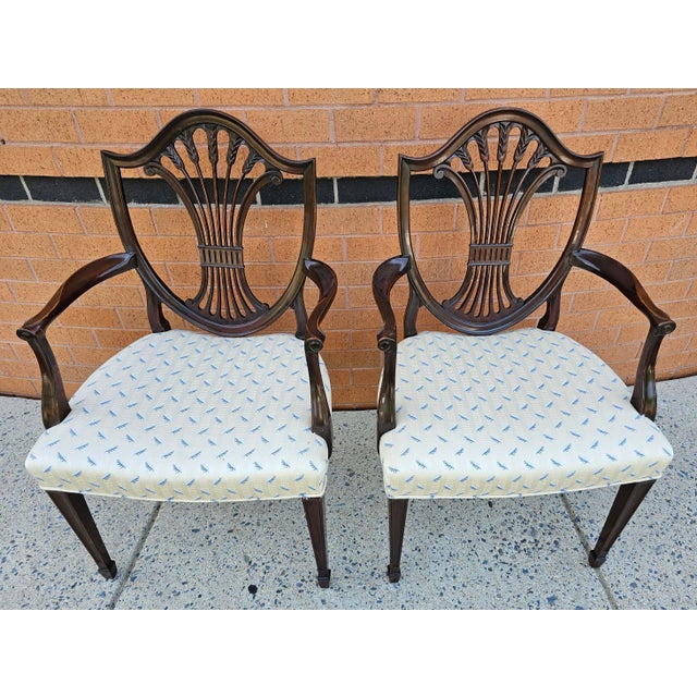 A Pair Of George III Style Mahogany Shield-Back and Upholstered Arm Chairs. Very good vintage condition. Measures 24" in...