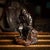 Antique 19th Century Japanese Meiji period bronze okimono. The elderly man is seated at rest on a removable wooden bench...