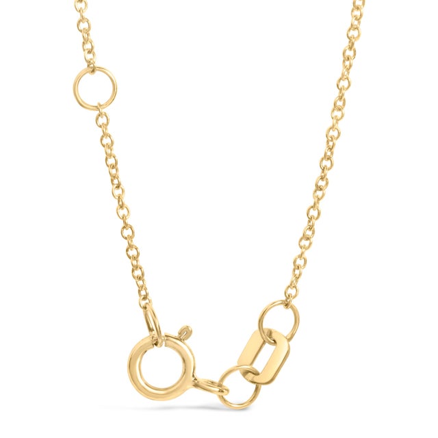 Infuse your ensemble with a sprinkle of shimmering elegance with this exquisite 10K yellow gold bracelet, masterfully...