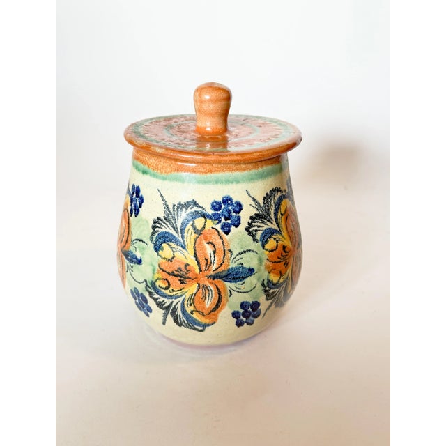 Beautiful Mexican Majolica lidded jar with lovely subtle colored glaze, featuring traditional floral and leaf patterns....