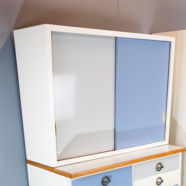 Authentic German-made kitchen wall cabinet with an iconic, forward-sloping front. Freshly restored, super stylish, and...