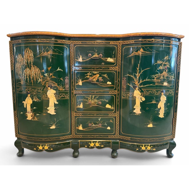 An exquisite and visually striking mid-to-late 20th-century Chinese credenza boasting a highly desirable deep emerald-...