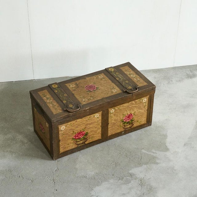Wonderful Hand Painted Folk Art Chest in Iron Late 19th Century. A truly wonderful hand painted folk art chest with floral...