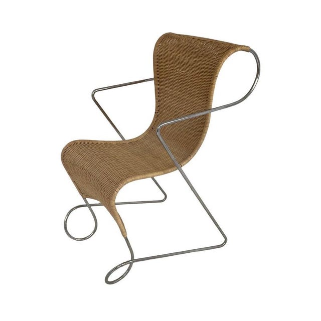 Vintage chair designed by Ron Arad for Driade. A sculptural and harmonious shape, light and elegant. Comfortable and...