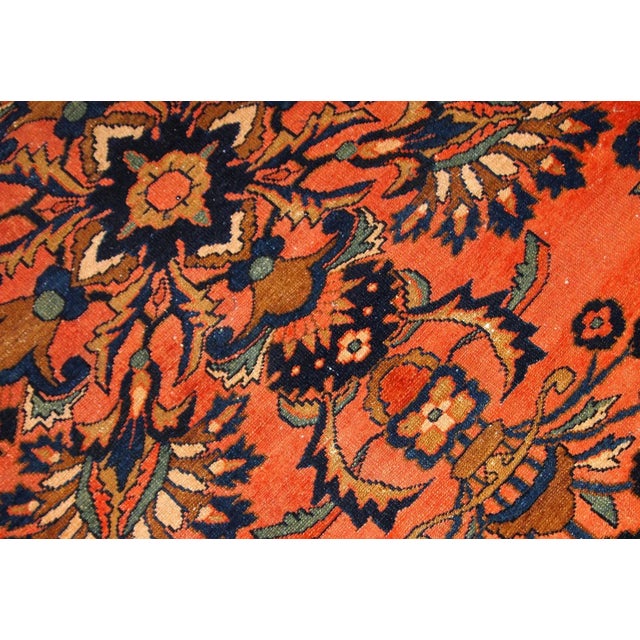 Antique hand-woven Liliahn rug in navy blue, white and red colours. This rug is from the beginning of 20th century in...