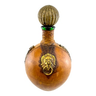 1960s Italian Leather Wrapped Decanter With Lion Head Brass Medallion For Sale