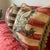 Pair of wool Aubusson pillows featuring lion designs on striped backgrounds. Beautiful tassel trim and backed with...
