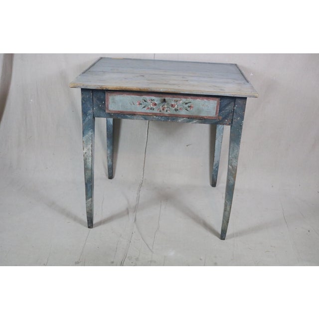 A Gustavian style Swedish writing table dating from the early 19th century. It is very unusual in that it retains its...