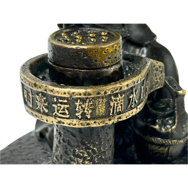 Vintage Bronze Color Metal Old Style Dressing Kid Grinding Pose Statue For Sale - Image 12 of 13