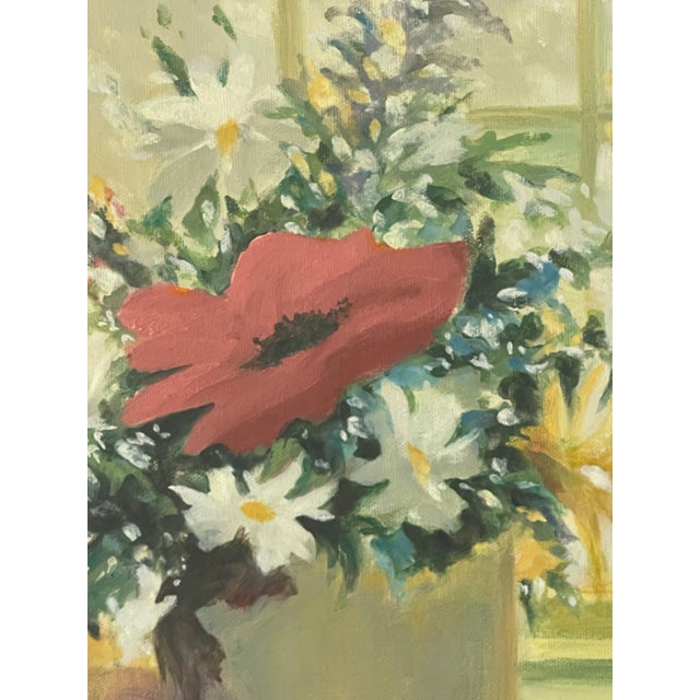 Lovely floral acrylic on canvas painting signed and dated. Framed in white frame.