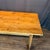 Classic French farmhouse dining table, purchased in France, with a long rectangular plank top, simple straight apron and...