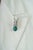This bunny brooch features a vibrant 3.08 carat emerald Crafted in 14K white gold, measuring approximately 9 x 12.11 mm,...