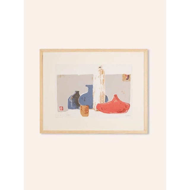 Simple still life with different vessels. Numbered (e.a / productruck) and signed. Color lithography on paper. Hanged on...