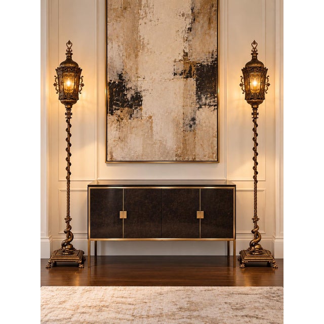 Absolutely stunning and monumental pair of mid twentieth century Italian-made gilt metal and iron floor lamps. Italian...