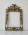 A stunning Spanish gilt bronze picture frame, embellished in Gothic Victorian era styling, with ornate pierced motif...