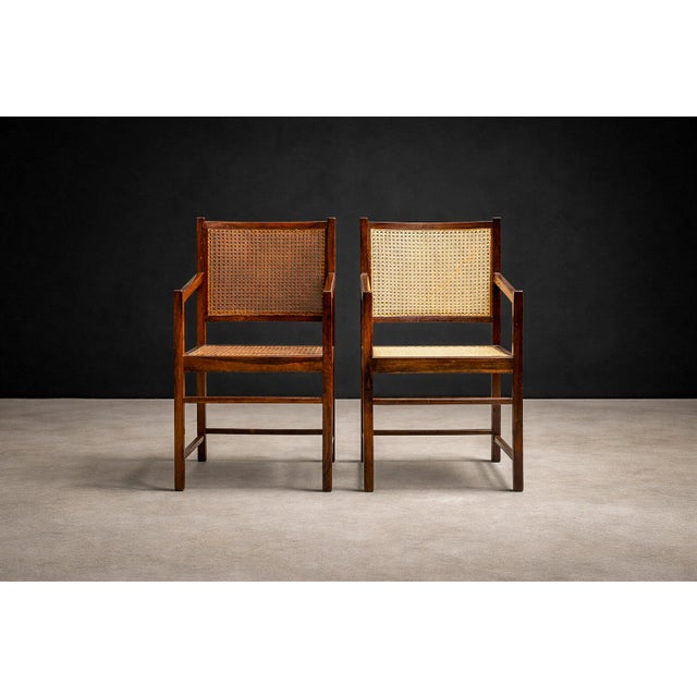 Attributed to an unknown Brazilian maker and dating to the 1960s, this pair of armchairs reflects the disciplined clarity...