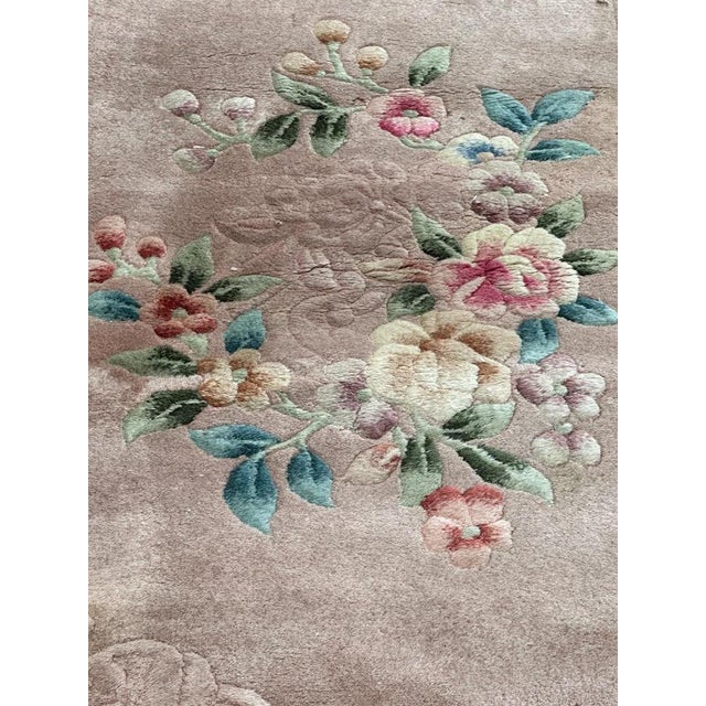 Very beautiful mid century Chinese rug with beautiful Chinese art deco design in a pink background with a beautiful floral...