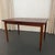 This stunning Scandinavian Modern rectangular rosewood extension dining table was designed circa 1960. This dining table...