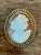 This vintage Victorian 12k hand-carved cameo pendant is a fine example of nineteenth-century-inspired jewelry...