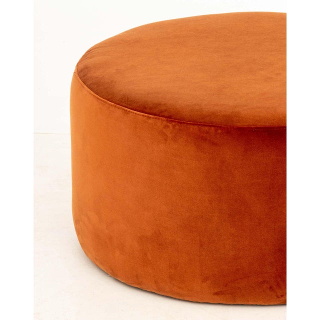 Modern Burnt Orange Velvet Circular Ottoman. 12.5" H x 23.25" Diameter. Provenance: From a New York City Collection.