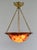 établissement Émile Gallé A French art deco hanging fixture in gild bronze with a Gallé bowl in acid-engraved cameo glass....