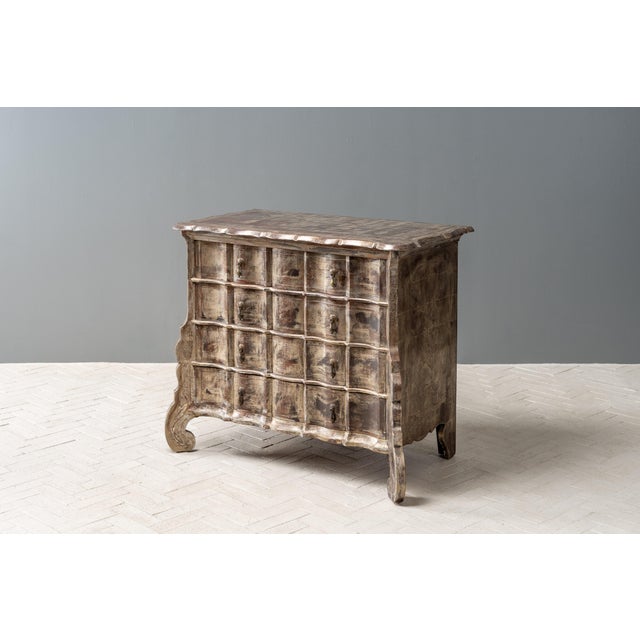 USA, ca. 1940s. A hand-painted silver leaf dresser attributed to German born artist Max Kuehne (1880-1968). Features all...