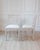 A refined pair of late 18th-century Swedish Gustavian dining chairs, showcasing the balance and symmetry of neoclassical...