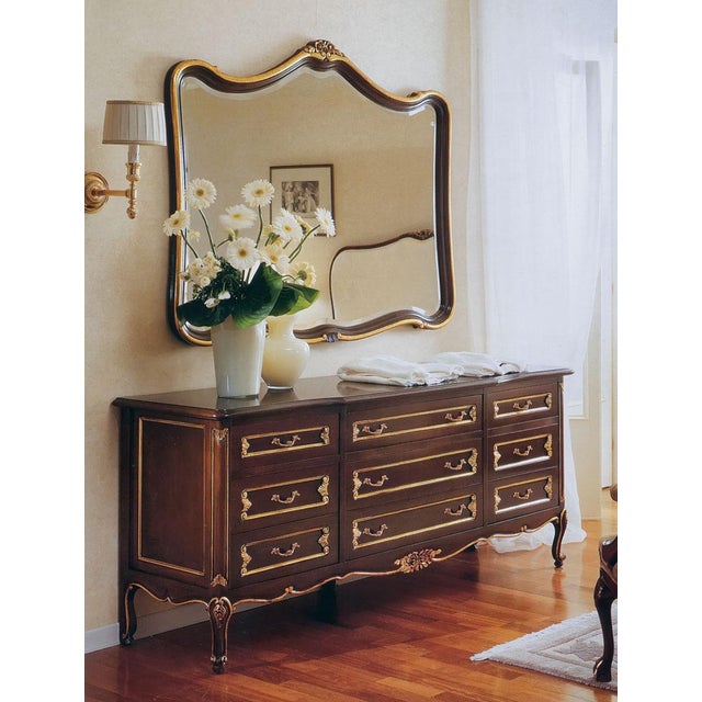 Handcrafted in Italy, this striking French Baroque triple dresser features nine spacious drawers framed in classic molding...