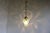 Rare Arts & Crafts brass hanging lamp with vaseline glass shade. Designed & produced by: Henry G. Richardson & Sons,...