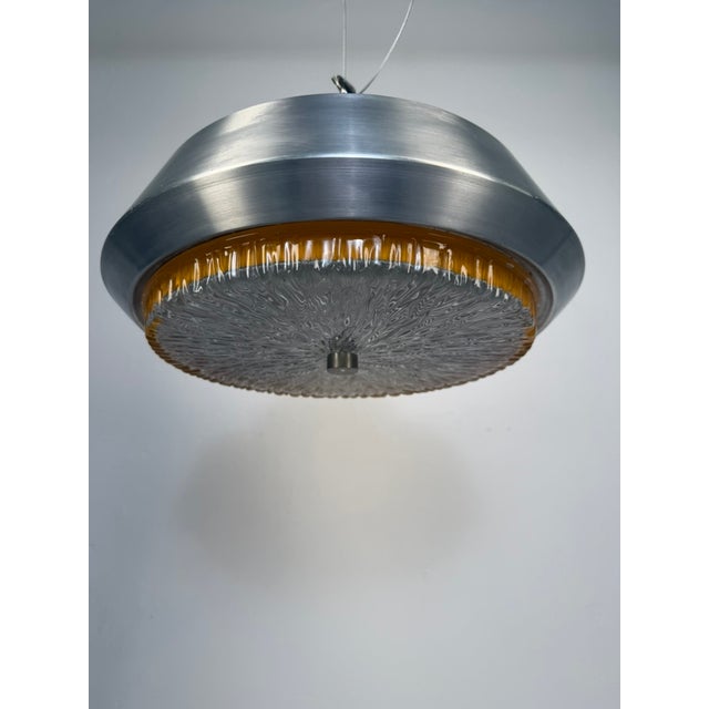 Original 1970s Space Age pendant lamp, featuring a striking combination of brushed aluminium, dark lacquered metal and...
