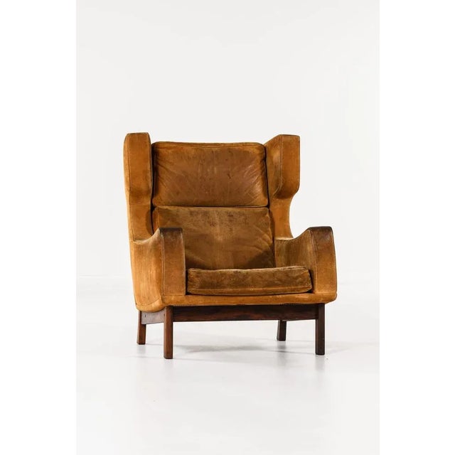 Very rare wingback easy chair by unknown designer. Produced in Denmark.